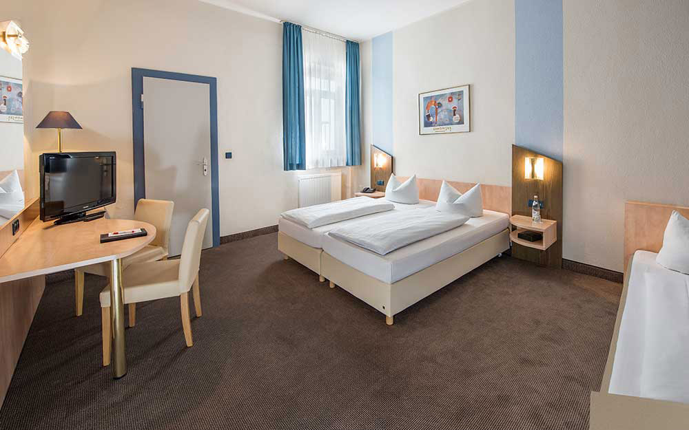 Dreibettzimmer im Hotel Weidenhof in Regensburg